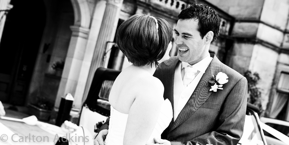 the bride and groom captured by the wedding photographer outside rookery hall cheshire