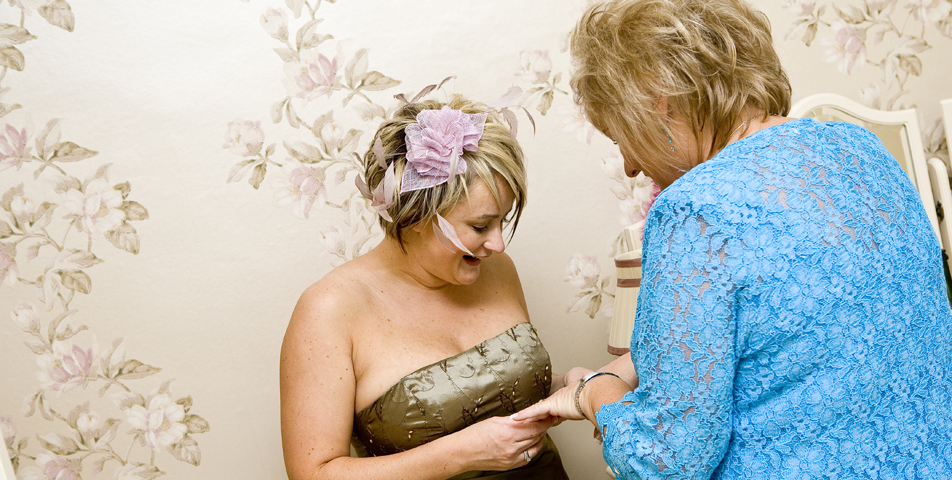 bridesmaid and mother of the bride before the wedding ceremony