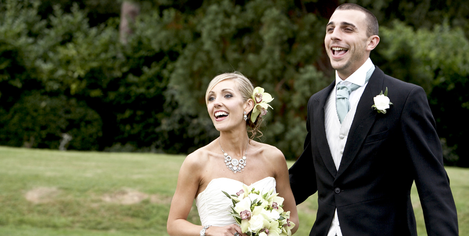 A happy moment captured on the wedding day at Rolleston Hall