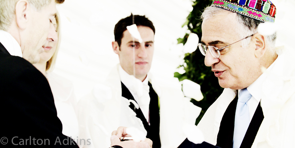 photography of the jewish wedding ceremony vows