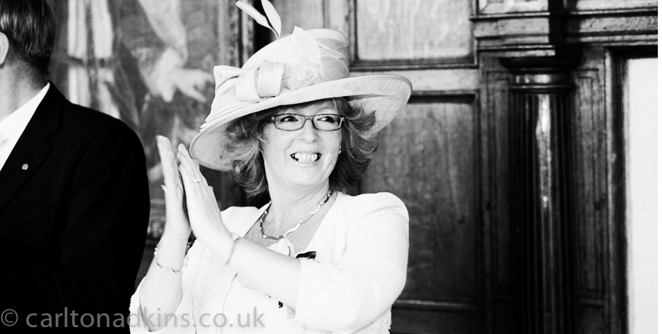 photography of the mother of the bride at the wedding breakfast at Littlecote House Hotel