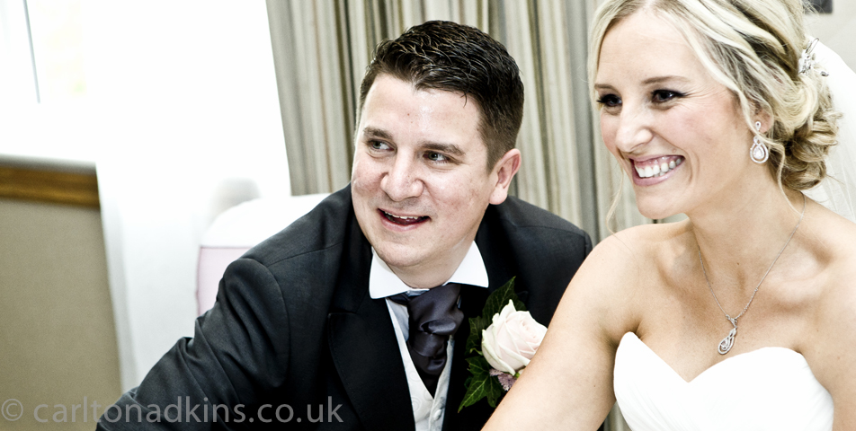 photography of the signing of the wedding register at the cottons hotel cheshire