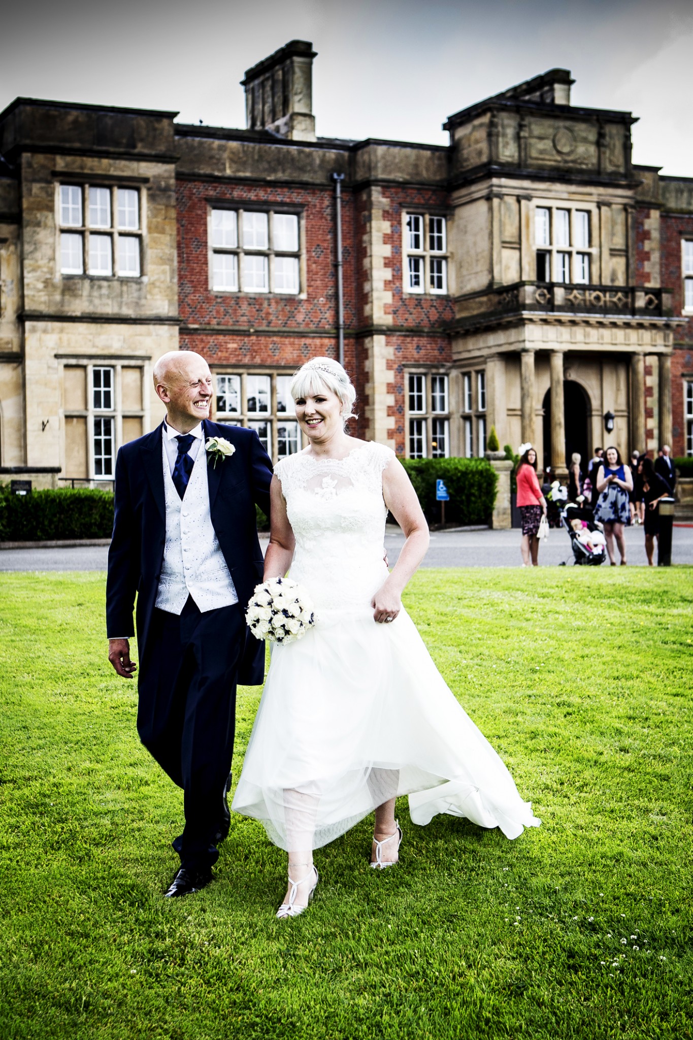 photography-of-the-groom-and-bride-outside-cranage-hall-cheshire