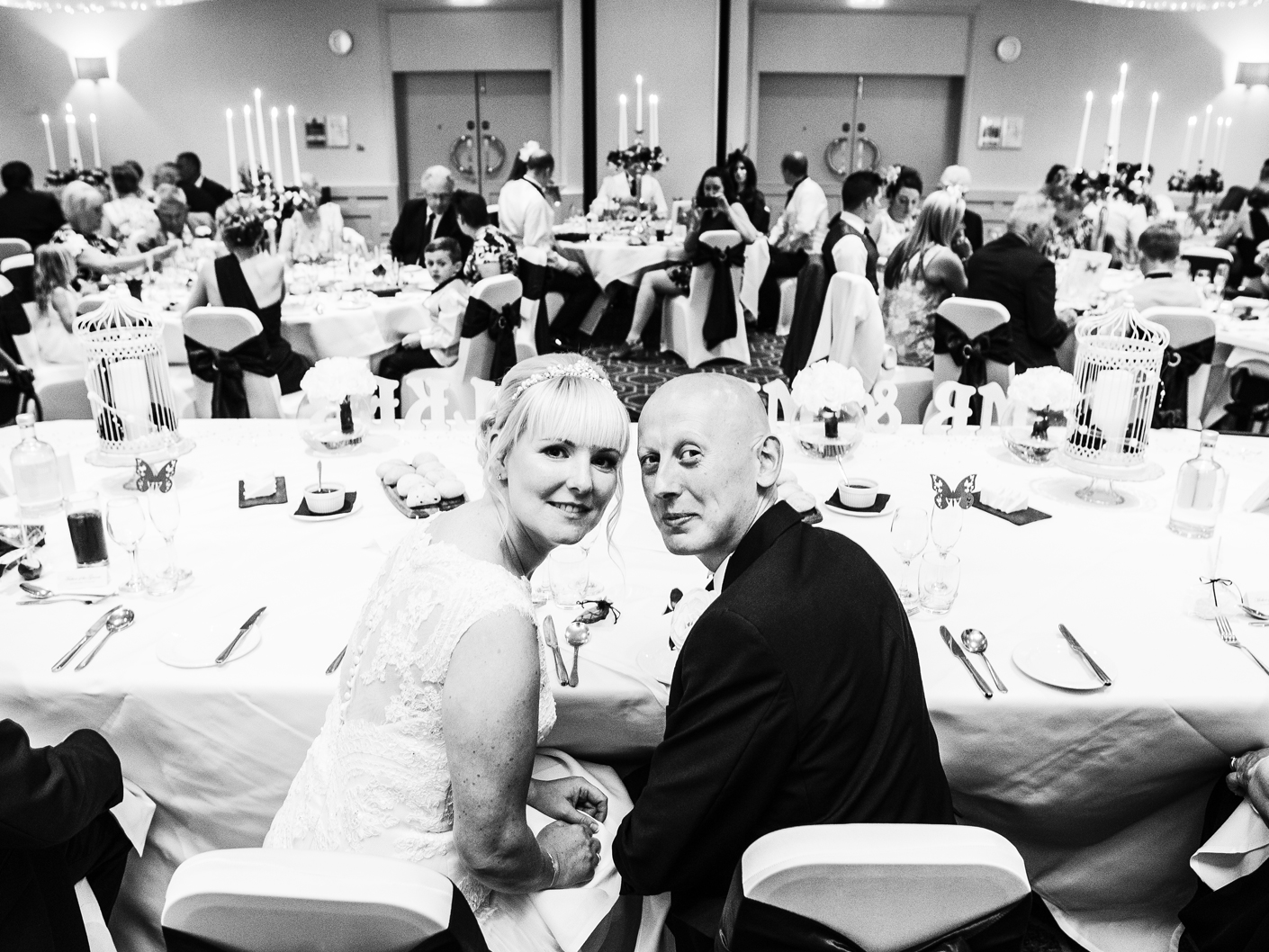 wedding-photography-of-the-bride-and-groom-at-the-wedding-breakfast-at-cranage-hall-cheshire