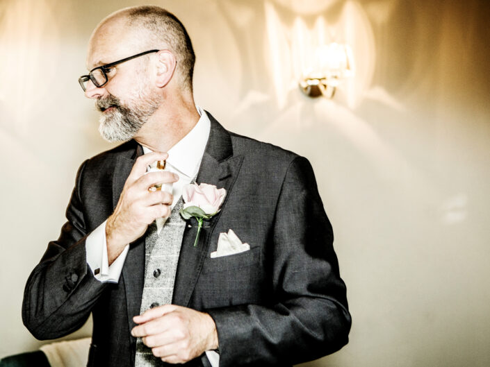wedding-photography-of-the-groom-in-oddfellows-hotel-chester