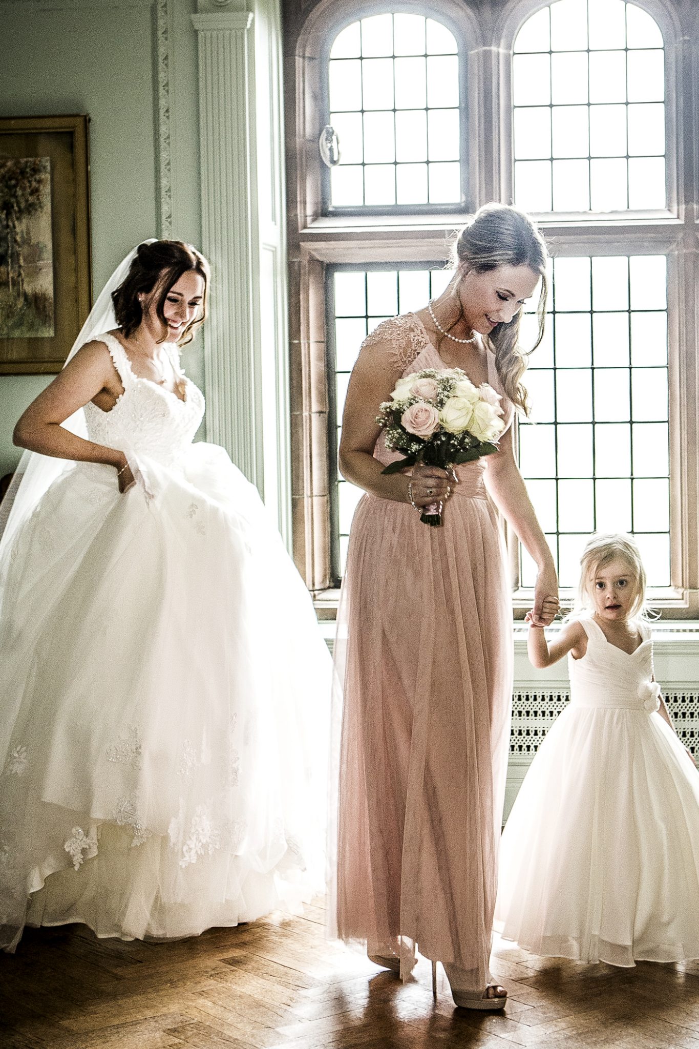 photography-of-the-bride-and-bridesmaids-before-the-wedding-ceremony-at-thornton-manor