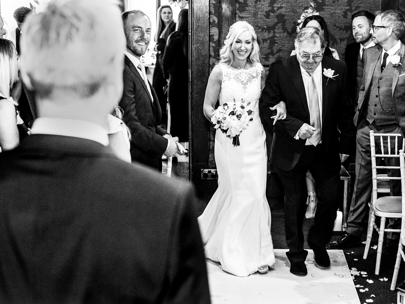 wedding-photography-of-the-bride-walking-down-the-aisle-in-cheshire