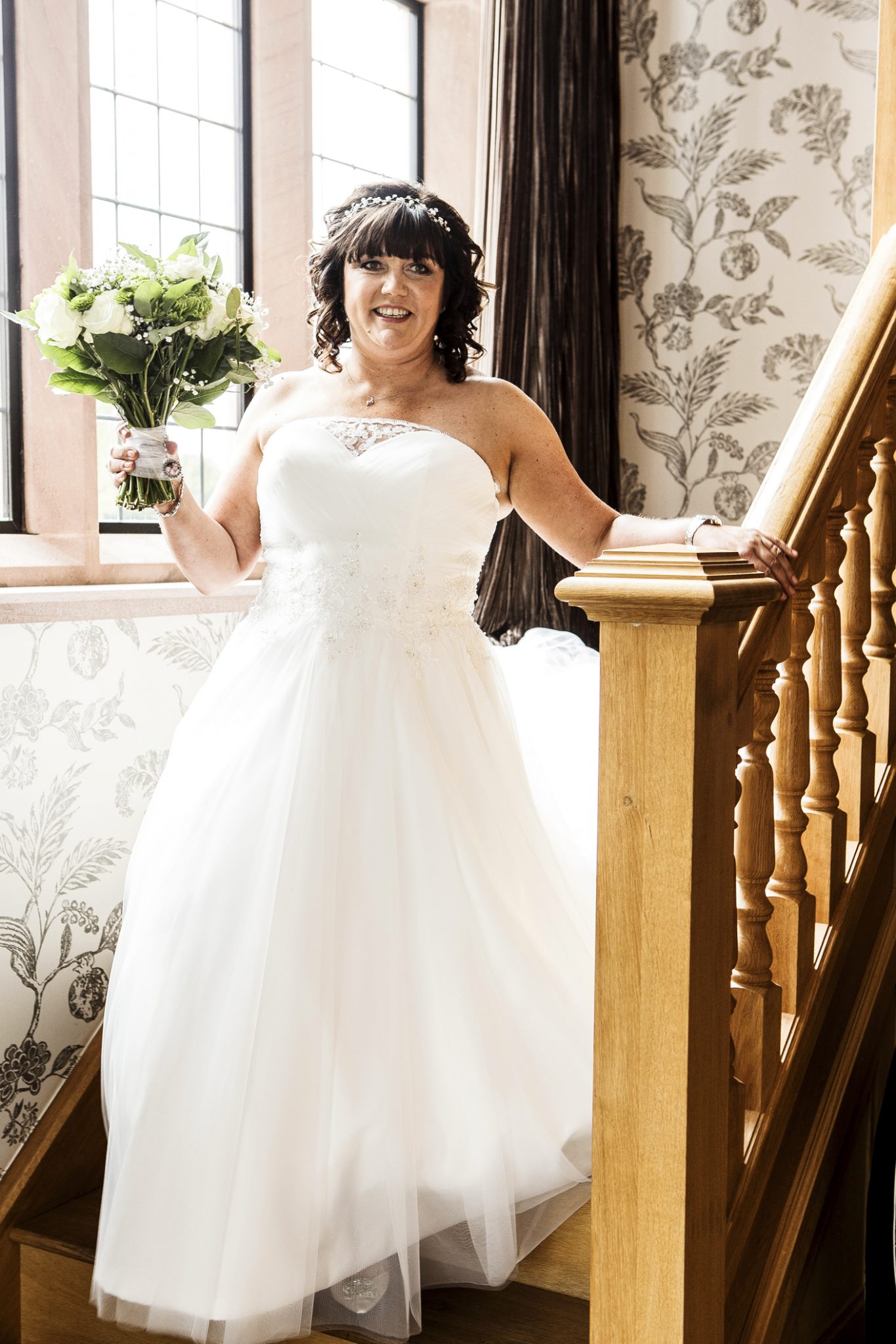 wedding-photography-of-the-bride-in-her-wedding-dress-at-merrydale-manor-knutsford-cheshire