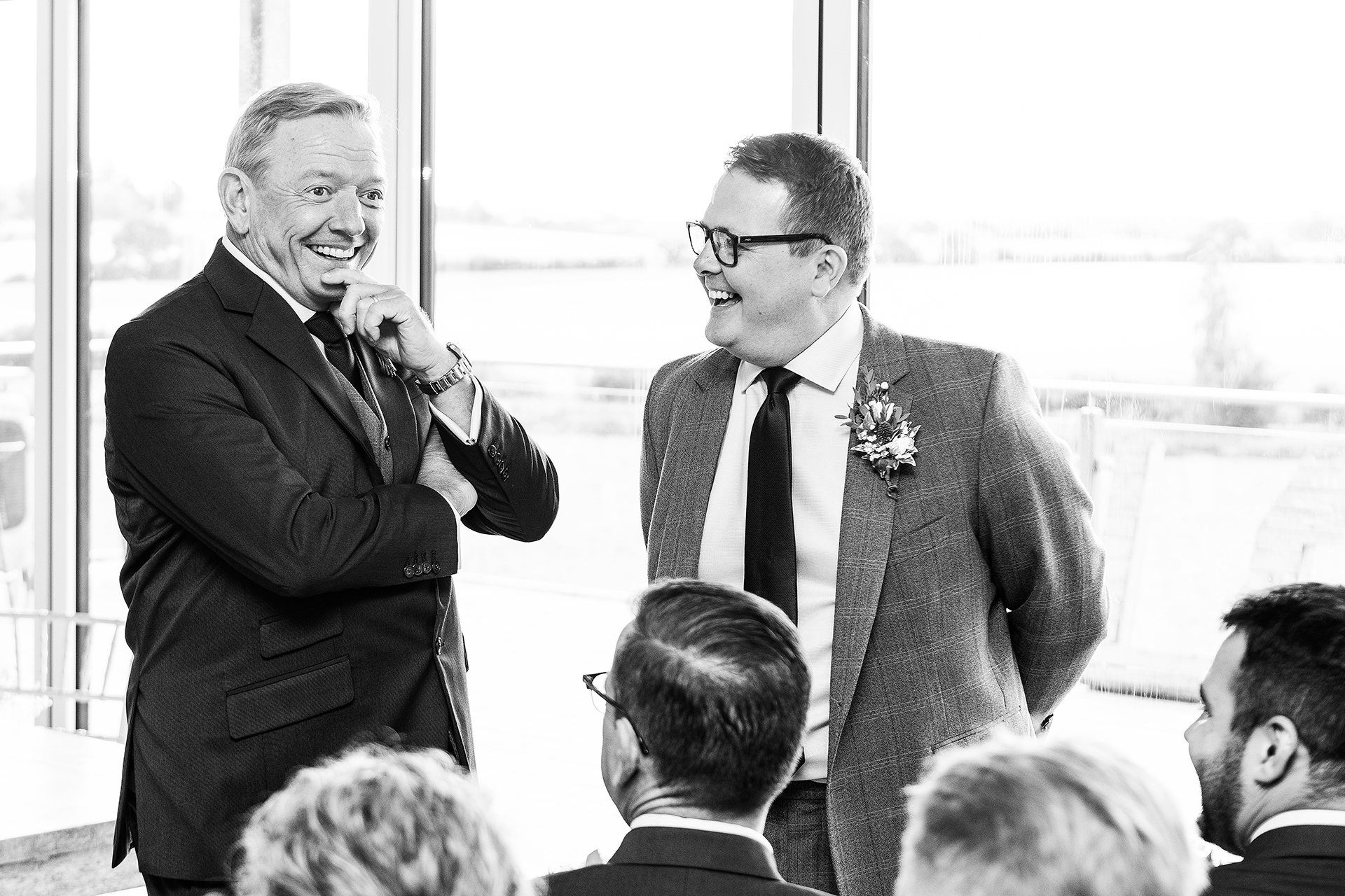 photography of the groom and best man before the wedding ceremony