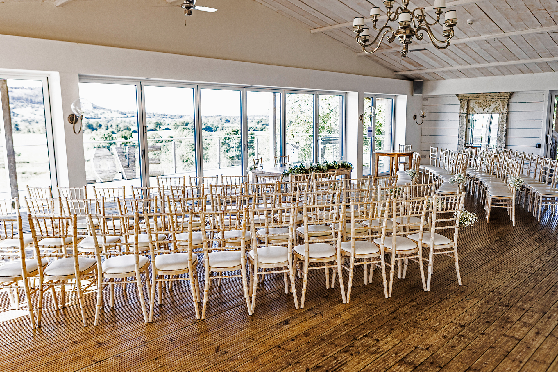 the wedding ceremony room at bash hall barn lancashire