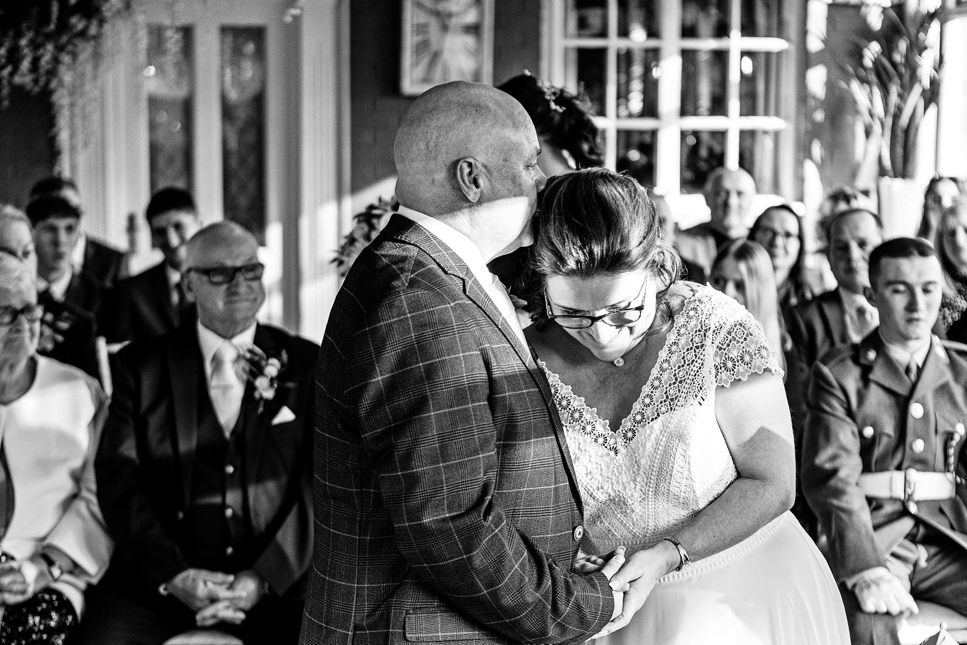 photography of the bride and groom saying the wedding vows at the vicarage hotel cheshire