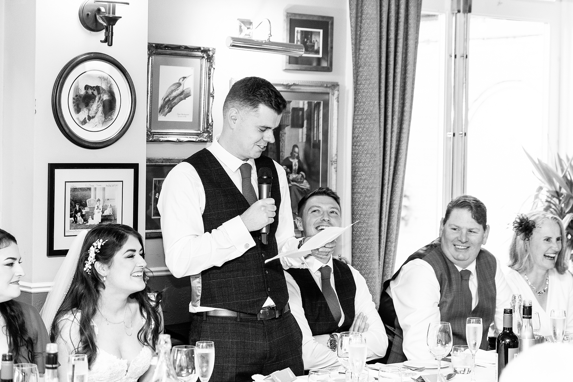 photography of the best mans speech at the wedding breakfast at the little fox wirral